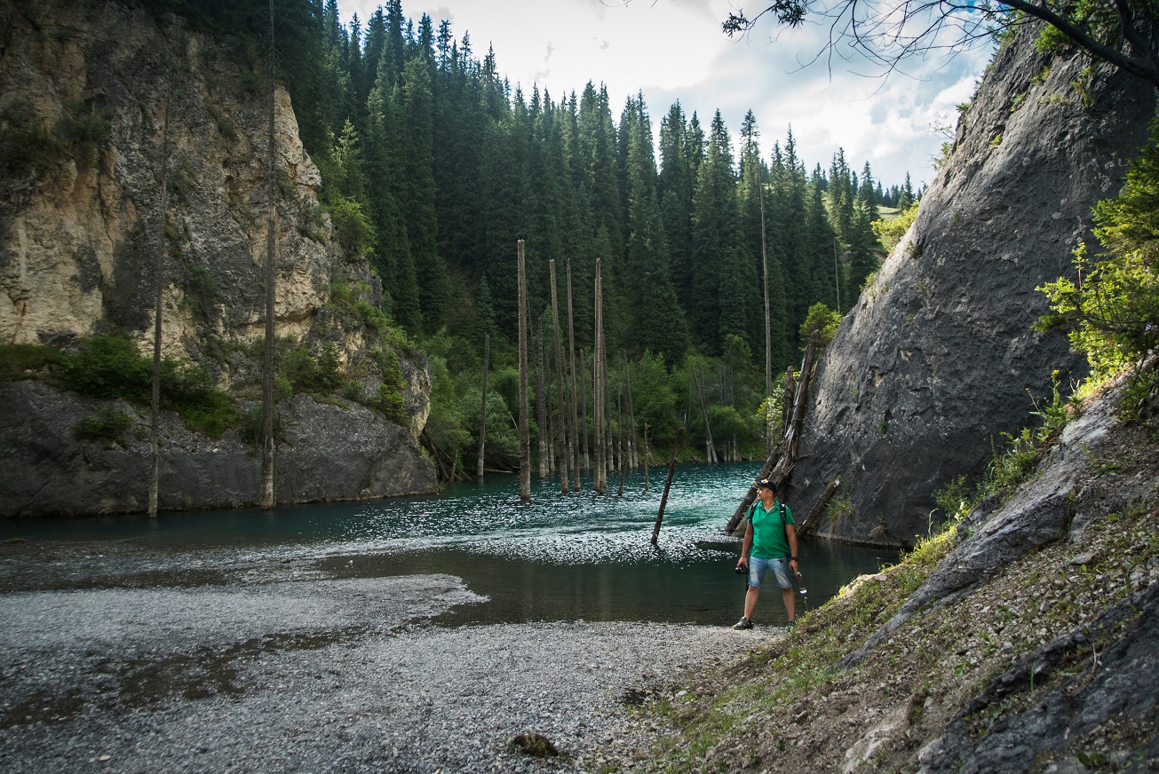 <p>River flowing into Lake Kaindy, photo by Dina Garrett</p>
