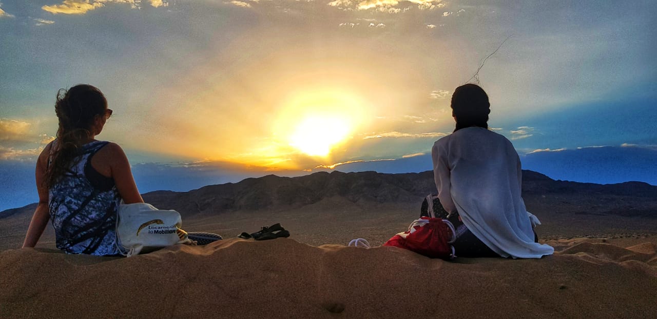 <p>Sunset on Singing Dune, guests from Switzerland, Kazakhstan</p>
